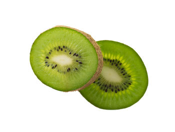Close-up of bananas against white background