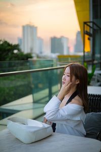 Young woman using mobile phone