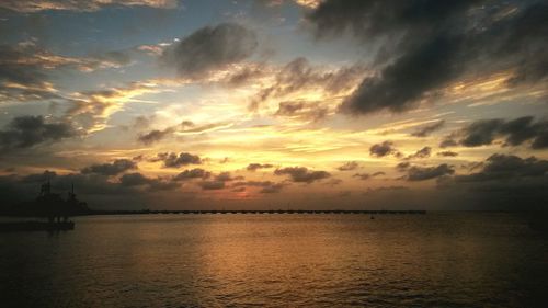 Scenic view of sea against sky at sunset