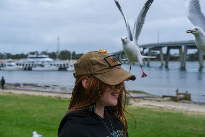 Side view of young woman looking away