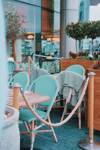 Chairs and tables in greenhouse