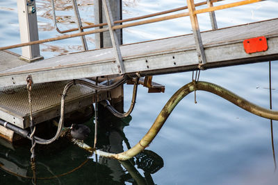 Low angle view of abandoned ship against sky