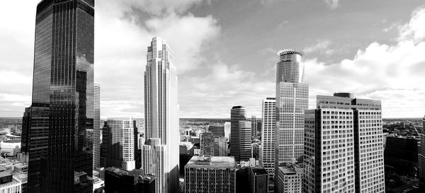 Low angle view of modern buildings against sky