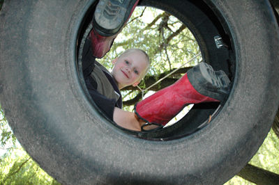 Boy playing in a car