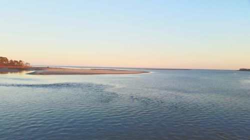 Scenic view of sea at sunset