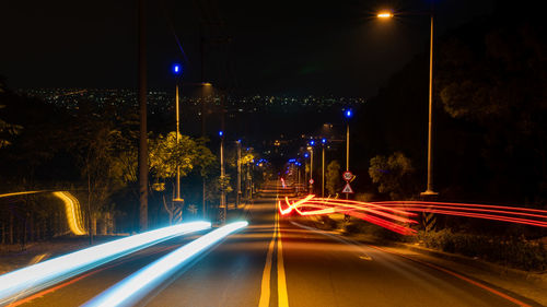 Light trails on road at night