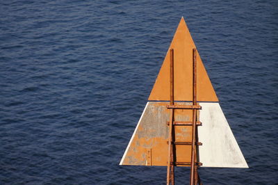 High angle view of yellow boat in sea