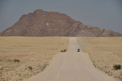 Scenic view of desert against clear sky