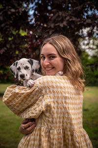 Portrait of woman with dog