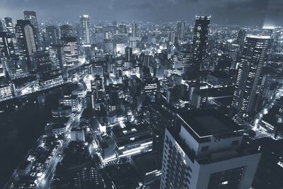 High angle view of illuminated city at night