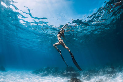 Man swimming in sea