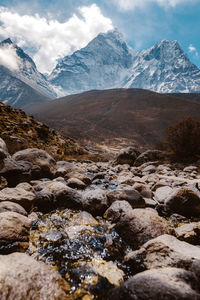 Scenic view of snowcapped mountains against sky