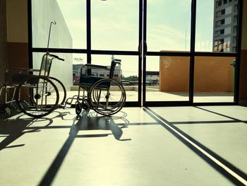 Bicycle on glass window of building