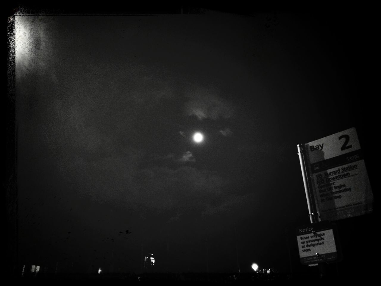 low angle view, night, sky, illuminated, transfer print, auto post production filter, moon, dusk, building exterior, communication, built structure, silhouette, architecture, dark, outdoors, no people, copy space, nature, street light, cloud - sky