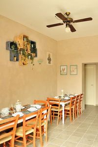 Empty chairs and tables against wall at home