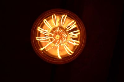 Close-up of illuminated light bulb