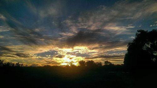 Scenic view of landscape at sunset