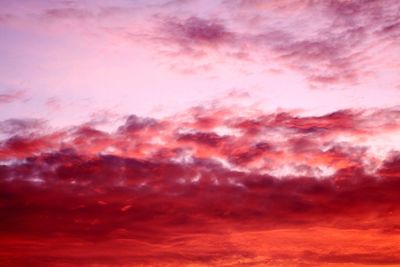 Low angle view of dramatic sky during sunset