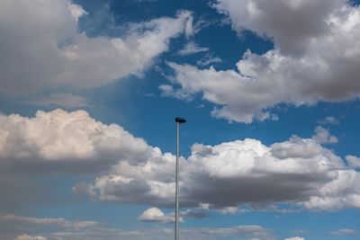 Low angle view of street light against sky