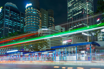 Illuminated buildings in city at night