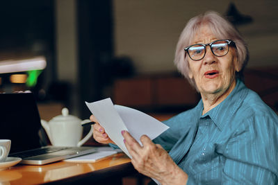 Portrait of man using laptop