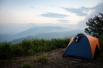 Scenic view of mountain against sky during sunset