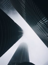 Low angle view of skyscrapers against sky