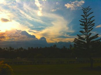 Scenic view of landscape against cloudy sky