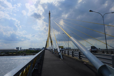 Bridge over road against sky
