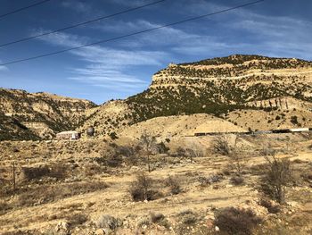 Scenic view of rocky mountains against sky