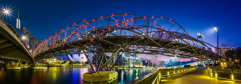 Ferris wheel in city at night