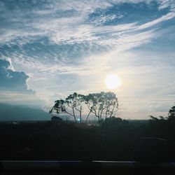 Scenic view of landscape against sky at sunset