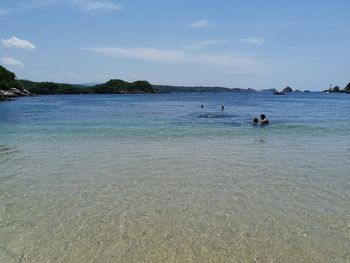 Scenic view of beach against sky