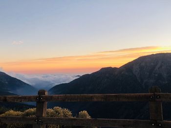 Scenic view of mountains against sky during sunset