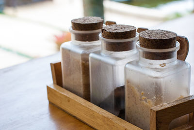 High angle view of bottles on table