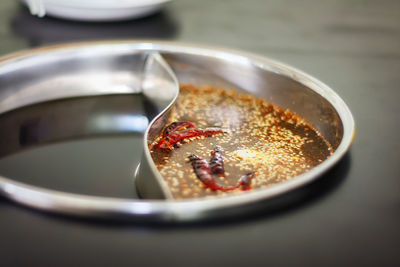 High angle view of meat in bowl on table