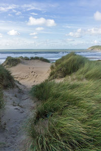 Scenic view of beach against sky