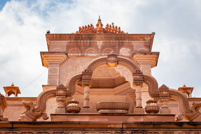 Artistic red stone jain temple at morning from unique angle