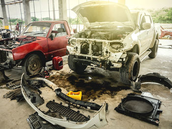 Damaged cars in garage