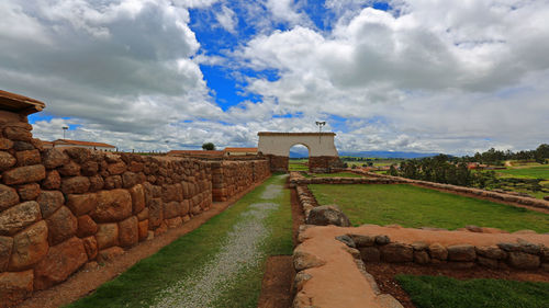 View of castle against cloudy sky