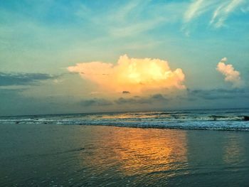 Scenic view of sea against sky at sunset
