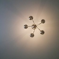 Low angle view of illuminated lights