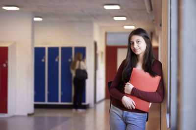 Teenage girl looking at camera