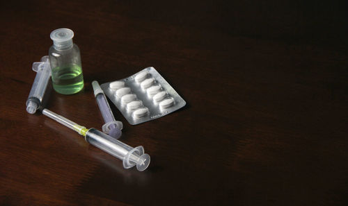 High angle view of bottles on table