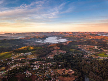 High angle view of townscape against sky during sunset