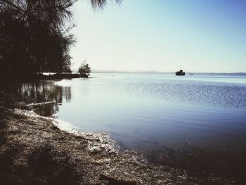 Scenic view of lake against clear sky