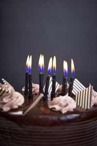 Close-up of burning candles