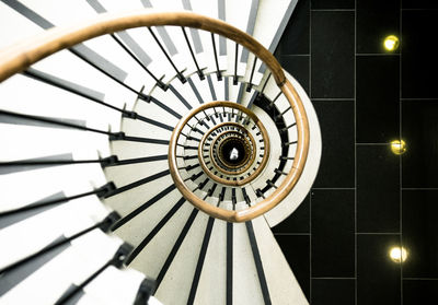 Directly below shot of spiral staircase in building