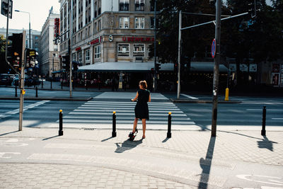 Full length of man walking on street