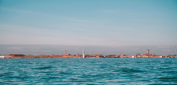 Scenic view of sea against blue sky